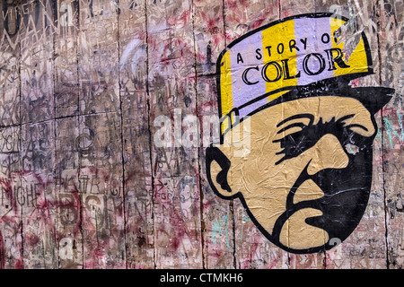 Graffiti and cartoon face in Rue de la Vicomte, Rouen, France Stock Photo