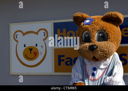 Miss Honey Bear mascot outside the halo Foods factory outlet at Tywyn, north Wales Stock Photo