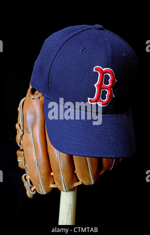 Wait till next year. Boston Red Sox baseball cap on a glove and bat. Stock Photo