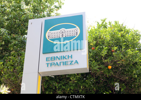 The Greek National Bank (Ethniki Trapeza) sign outside the branck in Rethymno, Crete. Stock Photo