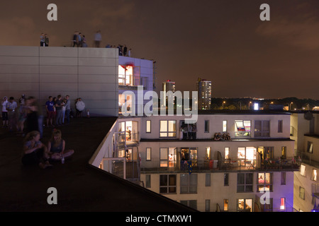 Londoners watching the opening ceremony of London 2012 Summer Olympics Stock Photo