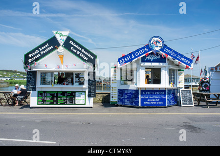 Harbour side food kiosks at West Bay in Dorset UK Stock Photo