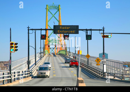 Traffic crossing the Angus L. MacDonald Bridge linking Dartmouth and Halifax, Nova Scotia, Canada. Stock Photo