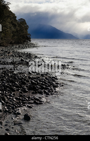 Breaking skies above Lake Te Anau, New Zealand 3 Stock Photo