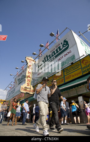 The famous Original Nathan's is always crowded with people ready to chow down along Surf Avenue at Coney Island, Brooklyn, NY. Stock Photo