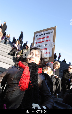 Hardest Hit Campaign 2011, with students protesting against welfare reform cutbacks to disabled people, outside City Hall London SE1 England UK Stock Photo