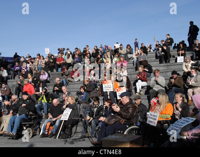 Hardest Hit Campaign 2011, with people protesting against welfare reform cutbacks to disabled people, outside City Hall London SE1 England UK Stock Photo