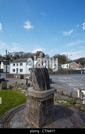 Wooden Statue of Dylan Thomas, Laugharne, West Wales, UK Stock Photo