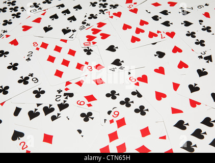 Playing cards on a green table. Stock Photo