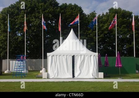 Empty landscape of still unused cycling time trials facilities in the grounds of the Tudor King Henry the Henry the Eighth's Hampton Court Palace in south west London - part of the London 2012 Olympics. The final bill for the 2012 Olympics could be ten times higher than the original estimate, according to an investigation. The predicted cost of the games when London won the bid in 2005 was £2.37billion. That figure has now spiralled to more than £12billion and could reach as much as £24billion, the Sky Sports investigation claims. Stock Photo