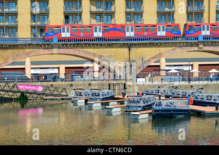 Water taxis moored close to Docklands Light Railway station providing waterborne transport to London 2012 Olympics at Stratford Stock Photo