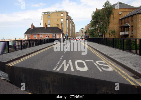 The Narrow Street Swing Bridge is sited between the Limehouse Basin Lock and the Thames Stock Photo