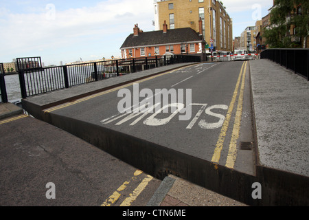 The Narrow Street Swing Bridge is sited between the Limehouse Basin Lock and the Thames Stock Photo