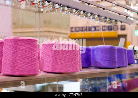 The colorful of the cone threads from textile factory Stock Photo - Alamy