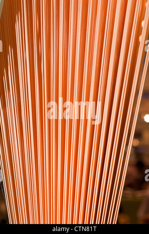 The colorful of the cone threads from textile factory Stock Photo - Alamy