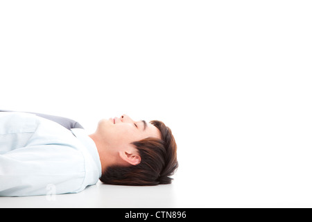 business man lying on floor for rest Stock Photo