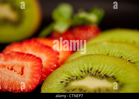 Sliced Kiwi and Strawberries Stock Photo