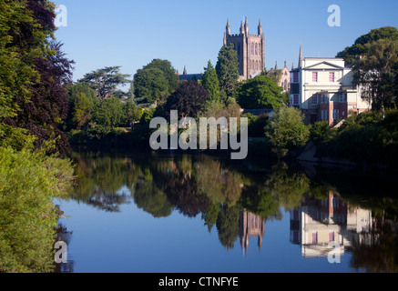 Hereford Cathedral reflected in River Wye seen from Victoria Bridge in early morning light Herefordshire England UK Stock Photo