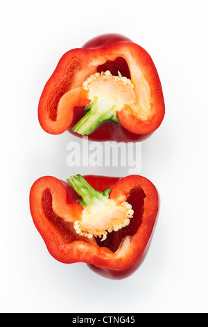 Red Pepper cut in half on white background Stock Photo