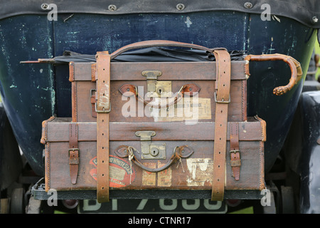 Leather luggage on the back of a vintage car Stock Photo