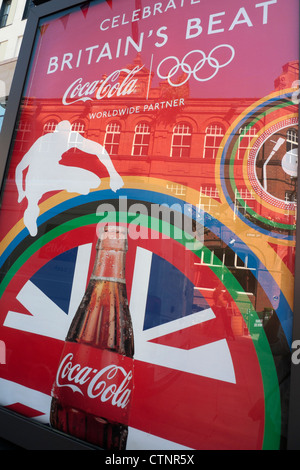 A poster for Coca Cola a corporate sponsor of the 2012 London Olympics Olympic campaign in Cardiff City Centre Wales UK Great Britain   KATHY DEWITT Stock Photo