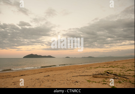 Early morning at Wongaling beach, a section of Mission Beach, with Dunk Island in view, at Cassowary Coast,Queensland, Australia Stock Photo