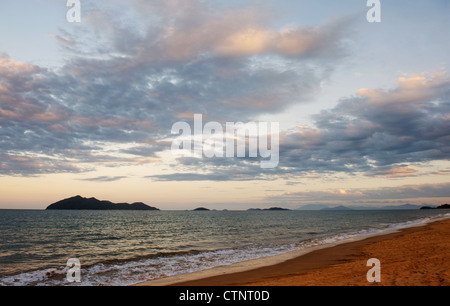 Early morning at Wongaling beach section of Mission Beach with view of Dunk Island on Cassowary Coast, Queensland, Australia Stock Photo