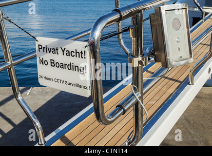 "Privat yacht no boarding" sign on luxury yacht in Spain Stock Photo