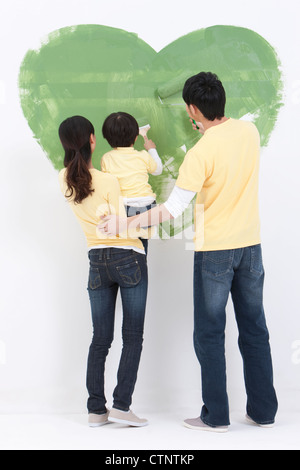 Young family doing home DIY Stock Photo