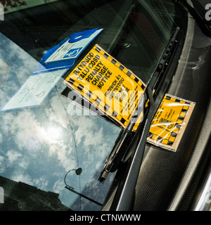 a bilingual welsh english fixed penalty parking fine on a disabled persons car, aberystwyth wales uk Stock Photo