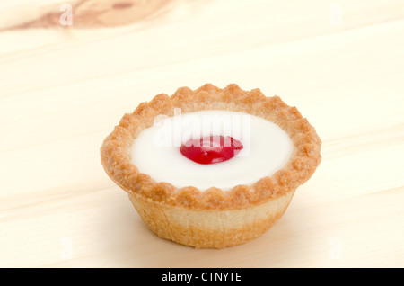 A cherry Bakewell tart from the bakery - studio shot Stock Photo