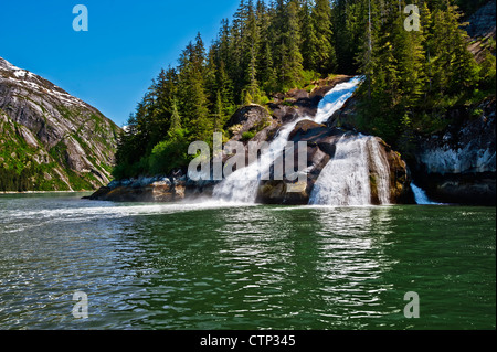 Icy Falls waterfall along the coast in Tracy Arm in Tracy Arm-Fords Terror Wilderness, Southeast Alaska, Summer Stock Photo