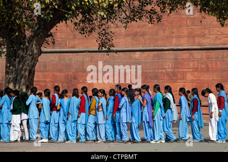 Muslim teenager girls wearing blue school uniforms in Old Delhi, India Stock Photo