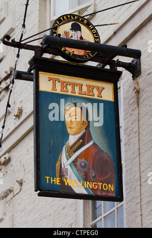 The Wellington; a Tetley painted Pub sign in Whitby a coastal town in North Yorkshire, UK Stock Photo
