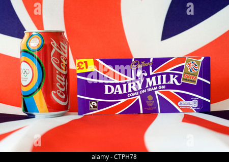 special edition bar of cadbury chocolate and coca cola can against union jack background for the olympic games Stock Photo