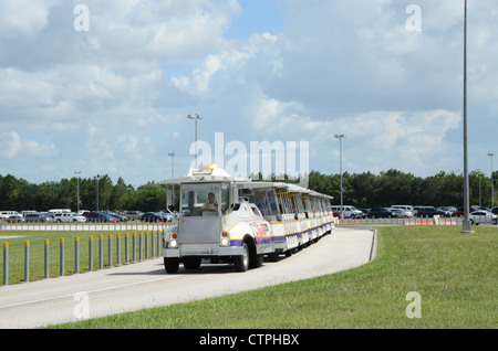 Disney Tram servicing the car park areas at Disney Florida. The tram collects and returns customer to and from the parking areas Stock Photo