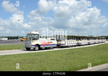 Disney Tram servicing the car park areas at Disney Florida. The tram collects and returns customer to and from the parking areas Stock Photo