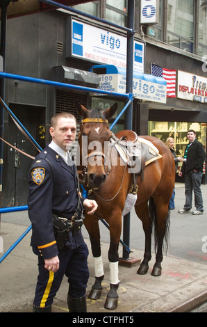 A member of the NYPD Mounted Unit before the start of the St. Patrick's Day parade in New York City on Mar. 16, 2002. Stock Photo