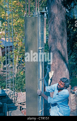 Man working at construction site, India Stock Photo