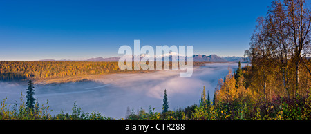 Scenic morning view fog in Chulitna River valley Mt McKinley in background Denali State Park Southcentral Alaska Autumn Stock Photo