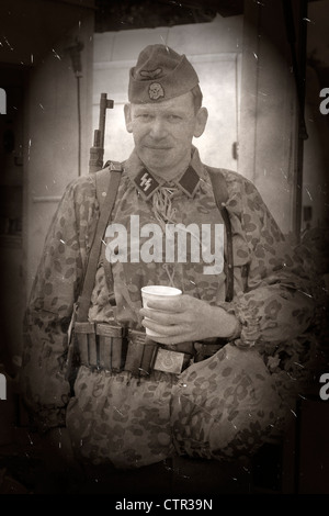 B/W image of a Waffen-SS Soldier in a camo Smock Stock Photo