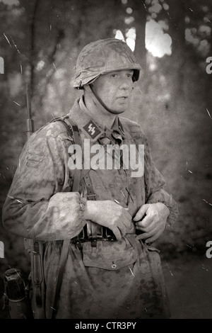 B/W image of a Waffen-SS Soldier in a camo Smock Stock Photo