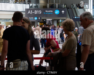 Passengers in Budapest Ferenc Liszt international airport terminal 2b interior, Hungary, Eastern Europe Stock Photo