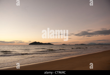 Early morning at Wongaling beach, a section of Mission Beach, with Dunk Island in view, at Cassowary Coast,Queensland, Australia Stock Photo