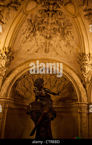 A statue of a woman in the Palais Garnier (Paris Opera House), in Paris, France Stock Photo