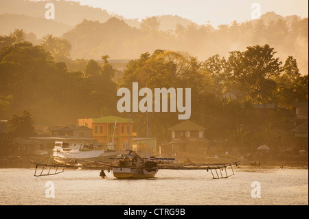 The busy harbor of Labuan Bajo on the Indonesian Island of Flores is the jumping off place for visitors to Komodo Island. Stock Photo