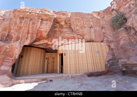 modern toilet in ancient cavern in Petra, Jordan Stock Photo