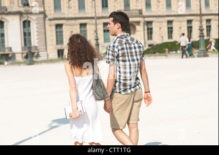 Paris, France - Young couple  walking outside Stock Photo