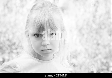 Monochrome portrait of a little blond beautiful Russian girl Stock Photo