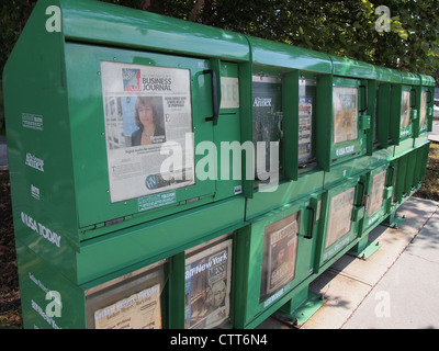 Newspaper vending machines at North White Plains train station, New York, USA, July 16, 2012, © Katharine Andriotis Stock Photo